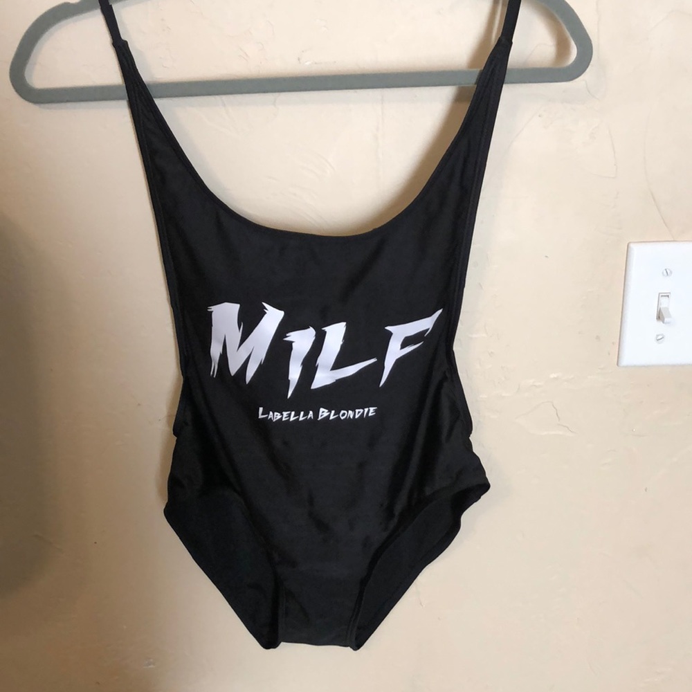 Brand new MILF bodysuit runs small.